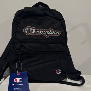 NWT Champion Mini Backpack with Zipper Front pocket and adjustable back strap.